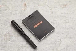 Rhodia No. 11 A7 Notepad - Black, Lined -Office Tools Rhodia ClassicNotepad TopBound A4 No11 Stapled Lined Black 1