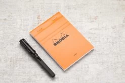 Rhodia No. 13 A6 Notepad - Orange, Lined -Office Tools Rhodia ClassicNotepad TopBound A4 No13 Stapled Lined Orange 1